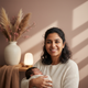 Close-up portrait of a smiling parent, representing a happy customer.
